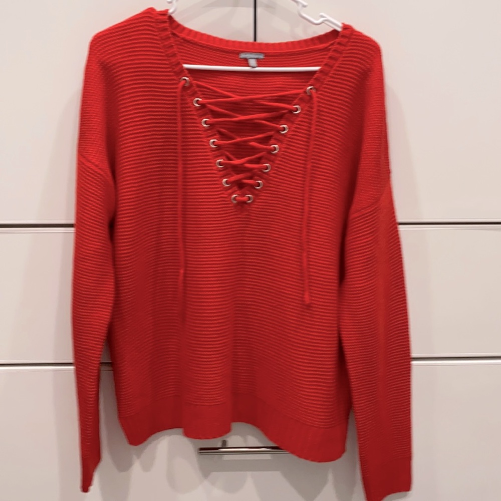 Sweater. Bright red
